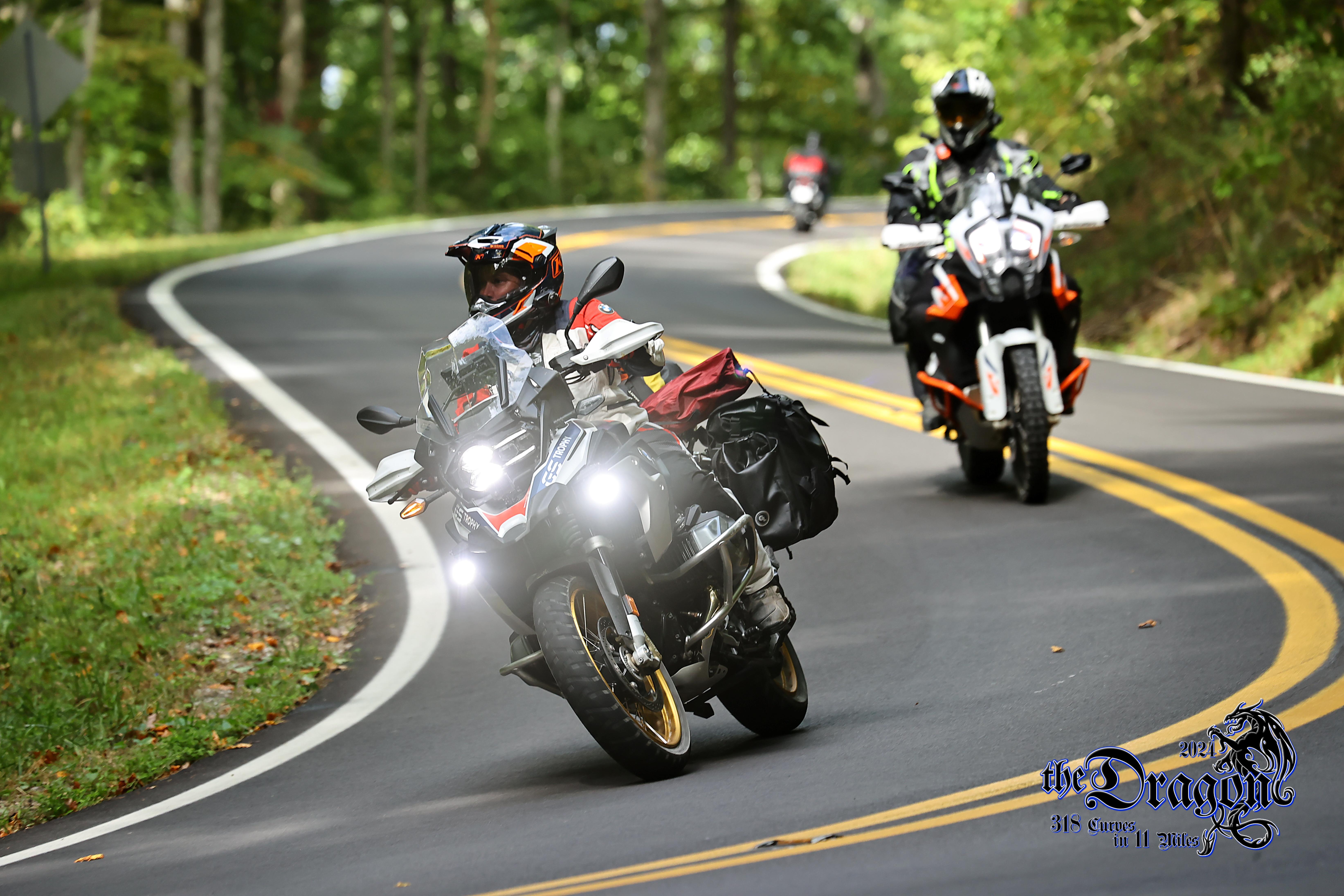 Two adventure motorcycles on the Tail of the Dragon, a twisty road featuring over 300 curves in 11 miles on the TN/NC border.